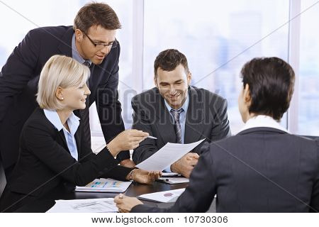 Businesspeople Working In Office