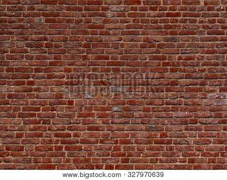 Terracotta Brick Wall Background Texture. Background Of Old Vintage Red Brick Wall. Grunge Red Brick