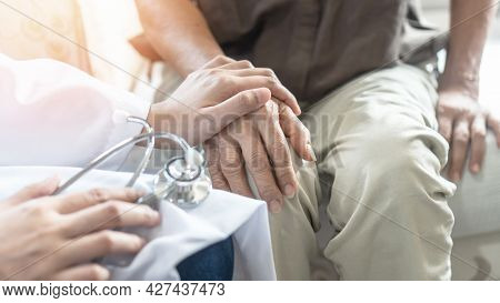 Parkinson Disease Patient, Alzheimer Elderly Senior, Arthritis Person's Hand In Support Of Geriatric