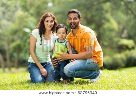 portrait of happy indian family outdoors