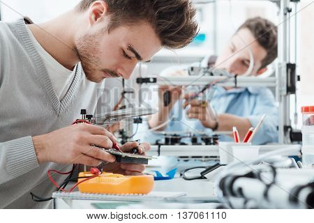 Engineering Students Working In The Lab