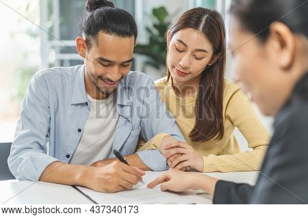 Happy Asian Couple Client, Tenant Buyer Home ,apartment, Sign Signature Contract Rental, Purchase. L