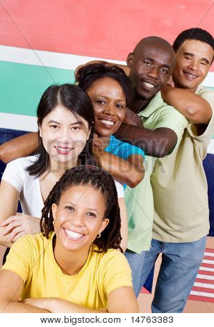 group of young diversity people in front of South African flag, 2010 concept