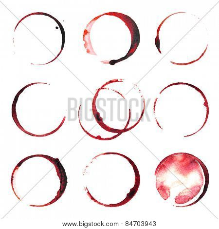 9 wine stains traces over white background