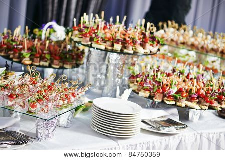 catering services background with snacks on guests table in restaurant at event party