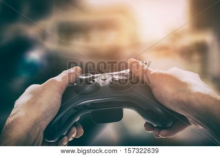 gaming game play tv fun gamer gamepad guy controller video console playing player holding hobby playful enjoyment view concept - stock image