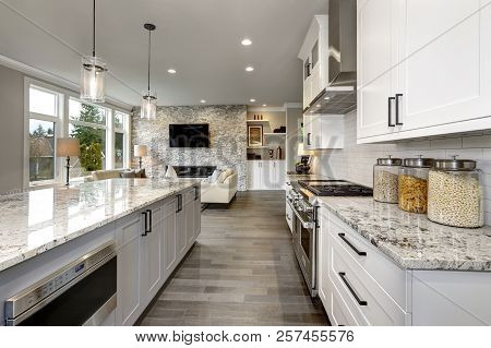 Beautiful Kitchen In Luxury Home Modern  Interior With Island And Stainless Steel Chairs