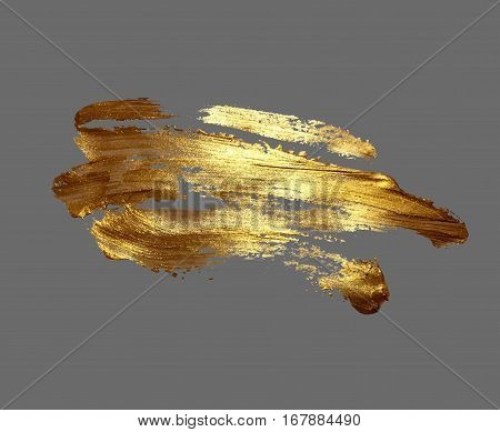 hand drawing gold brush stroke paint spot on a gray background, handmade vector illustration