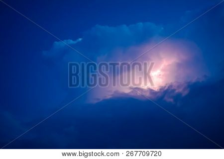 Lightnings In Storm Clouds. Peals Of A Thunder And The Sparkling Lightnings In Clouds.