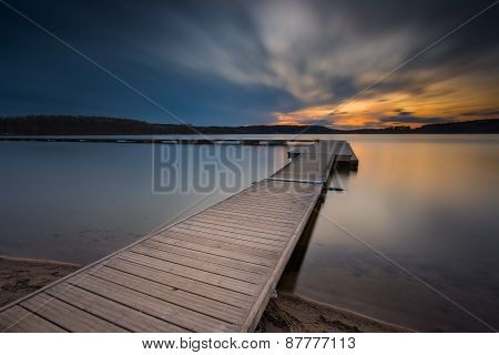 Beautiful Long Exposure Lake With Jetty At Sunset.