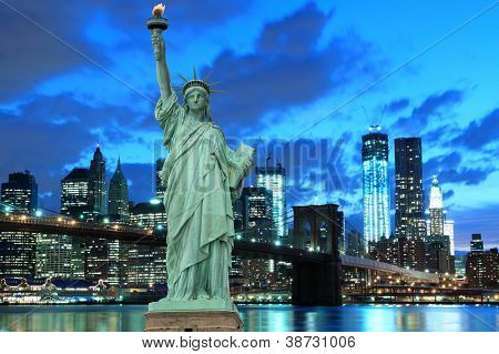 Brooklyn Bridge and The Statue of Liberty at Night, New York City