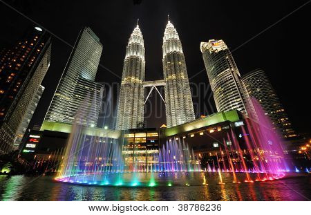 KUALA LUMPUR, MALAYSIA - AUGUST 31: Petronas Twin Towers at night on August 31, 2012 in Kuala Lumpur. Petronas Twin Towers  were the tallest buildings (452 m) in the world from 1998 to 2004.