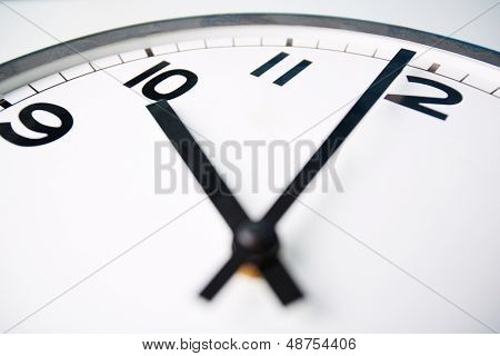 Macro shot of a clock face showing ten oÃ?ÃÂ¢??clock