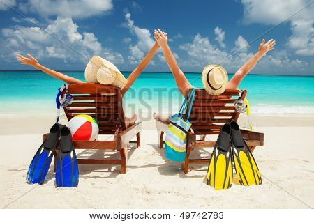 Happy couple on the beach of sea