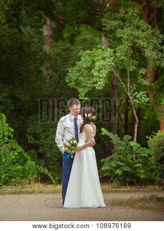 Bride and groom on their wedding day in garden