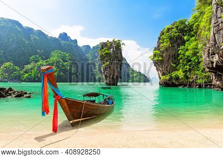 Famous James Bond Island Near Phuket In Thailand. Travel Photo Of James Bond Island With Thai Tradit