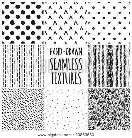 Set of eight black and white seamless hand drawn textures