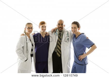 Half-length portrait of African-American man and Caucasian women medical healthcare workers in uniforms with arms around eachother standing against white background.