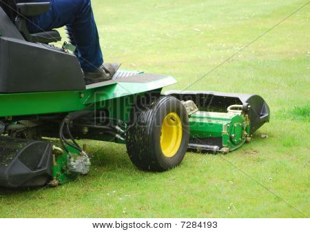 Man Cutting Grass