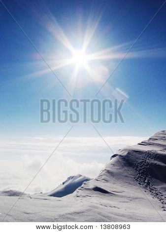 Sun and snow on the Caucasus mountains