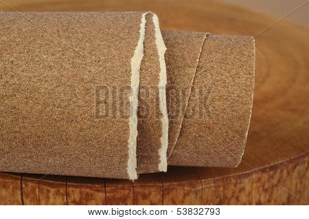 Sandpaper On Wooden Background