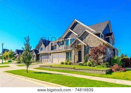 A perfect neighborhood. Houses in suburb at Spring in the north America.