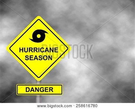 Hurricane Sign Road. Yellow Hazard Warning Sign Against Grey Sky - Tornado Warning, Bad Weather Warn