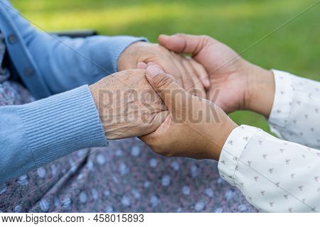 Holding Hands Asian Senior Or Elderly Old Lady Woman Patient With Love, Care, Encourage And Empathy 