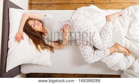 Girl Sleeping In Bed.