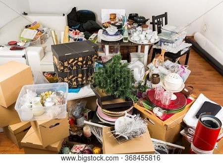 Messy room full of clutter and junk - Compulsive hoarding. Hoarding disorder.