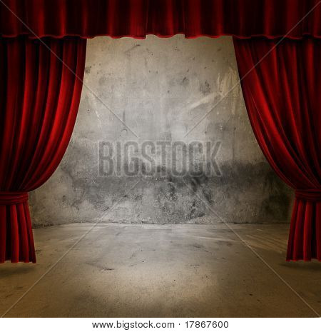 Small stage with red velvet theater curtains