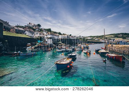 Coverack, Cornwall, Uk  - June 23, 2018. A Landscape Image Of The Picturesque Harbour Of Coverack In