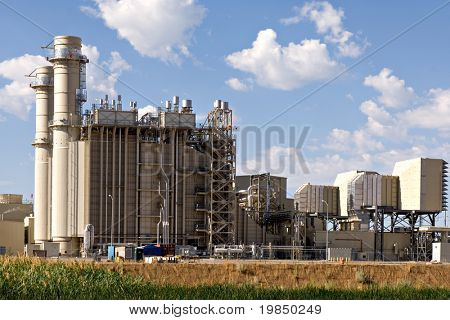 Industrial electrical power plant at the edge of a marsh