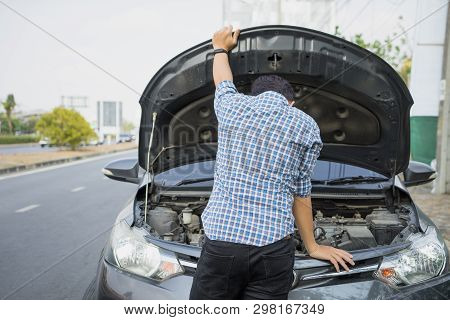 Mechanic Wearing Gloves Open Car Hood Checking Car Engine Oil On The Road After Car Breakdown Proble