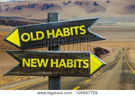 Old Habits - New Habits signpost in a desert road background