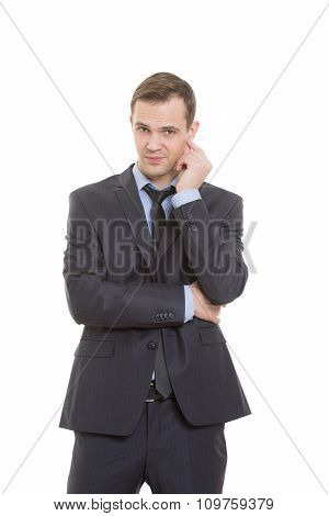 body language. man in business suit isolated white background. scratching, rubbing the ear. gesture