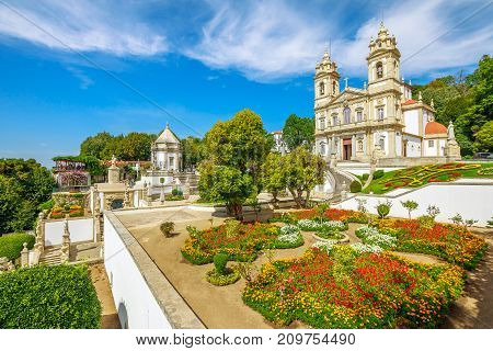 Historic Church of Bom Jesus do Monte and her public garden. Tenoes, Braga. The Basilica is a popular landmark and pilgrimage site in northern Portugal. Aerial landscape on the top of Braga mountain.