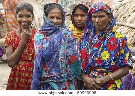 Women wait for their men from fishing in Mongla, Bangladesh.