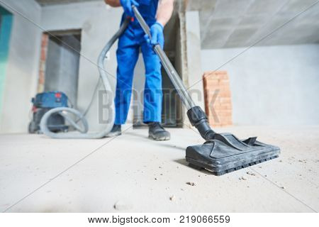 construction cleaning service. dust removal with vacuum cleaner