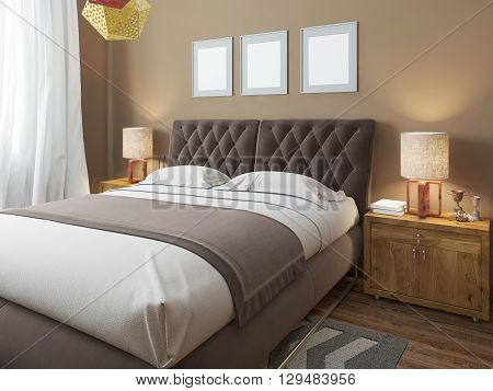 Luxury large modern double bed in the bedroom loft style. Bed linen in white and brown colors. Above the bed three mockup. On the sides are two bedside tables with lamps. 3D render.