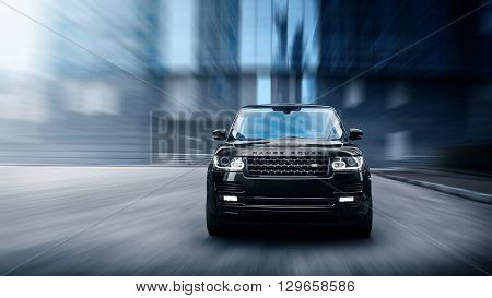 Moscow, Russia - November 22, 2015: Premium car Land Rover Range Rover fast drive on road in the city at daytime