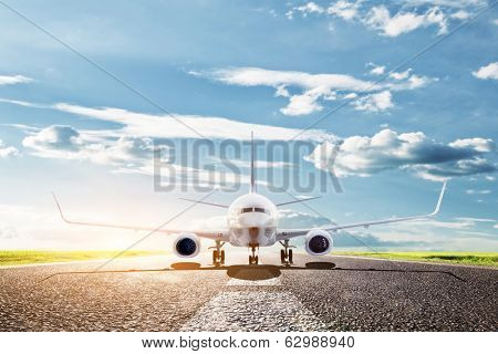 Airplane ready to take off from runway. A big passenger or cargo aircraft, airline. Transport, transportation, travel