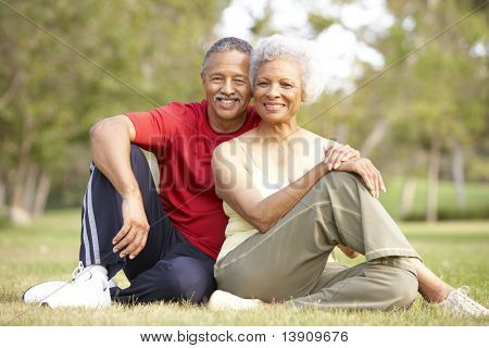 Senior Couple Resting After Exercise