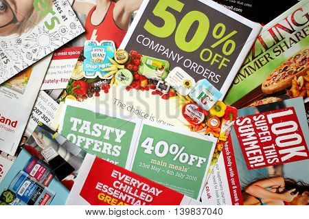 LONDON, United Kingdom - JULY 25: Sample of junk mail items delivered to a private residence in England as advertising for local retail businesses and services