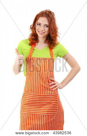 Young woman wearing kitchen apron, isolated on white