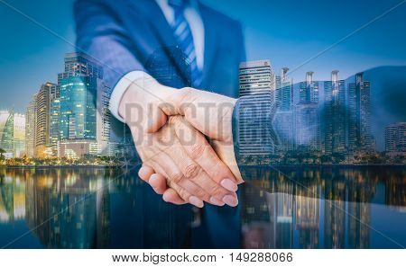 Business Man. Business handshake and business people on city background. Business Man. Business handshake and business people vintage tone. Business shake hand. Business working. Business room. Business office.