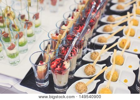 Beautifully Decorated Catering Banquet Table With Different Food Snacks And Appetizers On Corporate