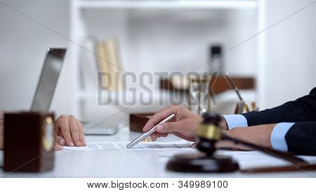 Attorney Showing Woman Where To Sign Divorce Document, Legal Consultation