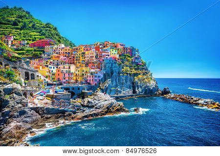 Beautiful colorful cityscape on the mountains over Mediterranean sea, Europe, Cinque Terre, traditional Italian architecture