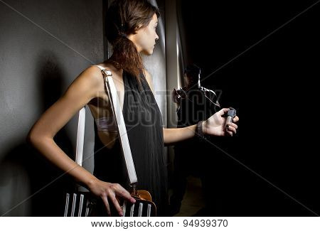 Woman in an Alley with Pepper Spray